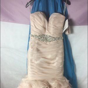 Blush pink wedding dress from Maggie Sottero